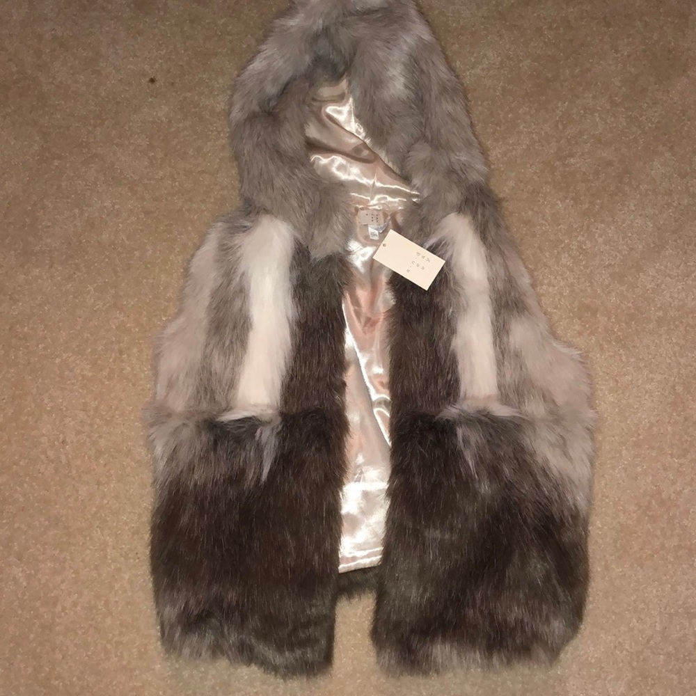 Brand new fur vest with tags